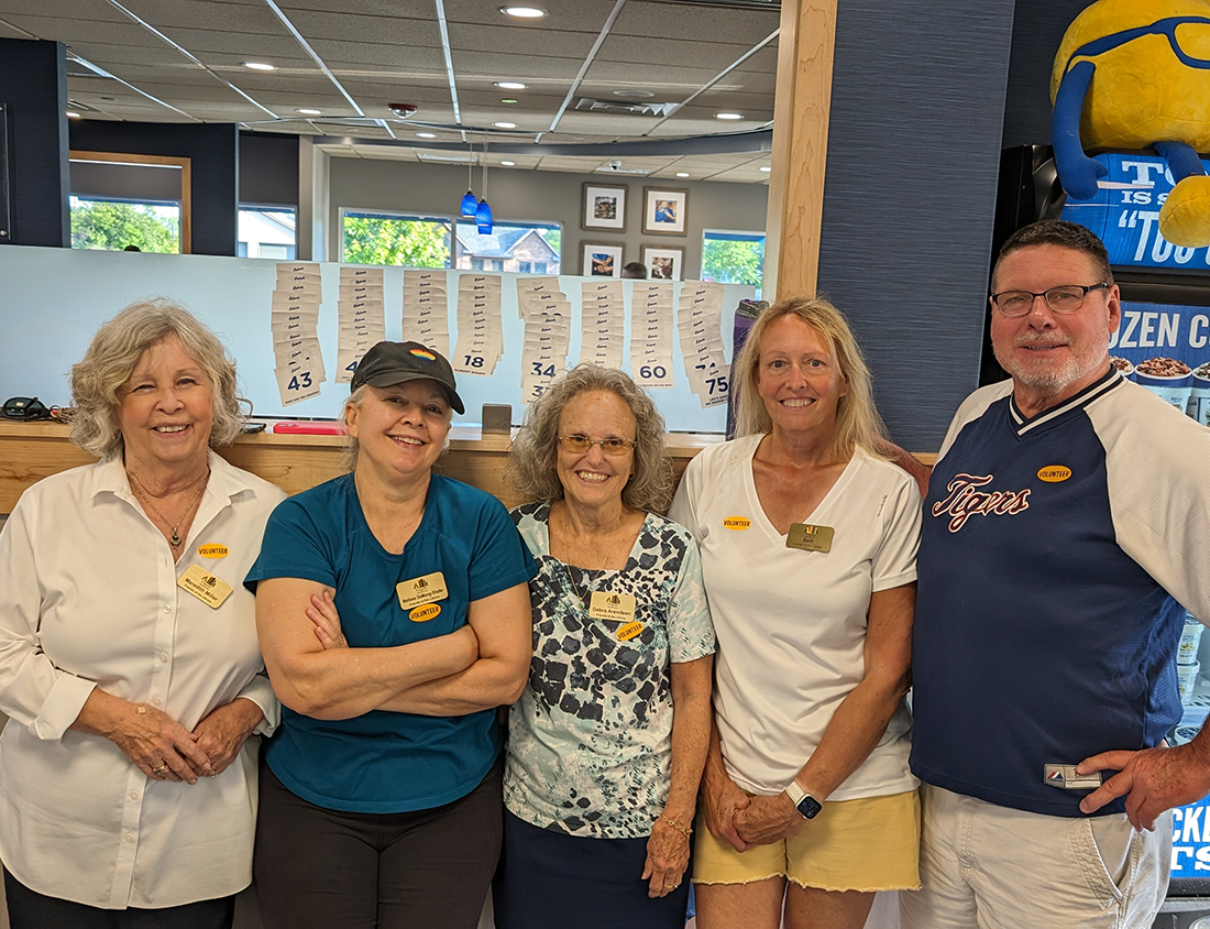 Five friends members smiling during the Culver’s Night Fundraiser