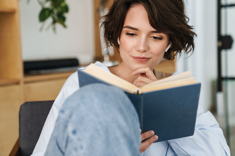 Adult woman reading a book
