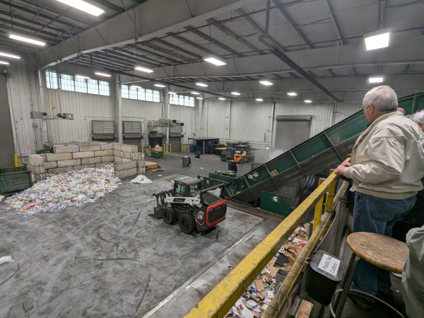 Group of adults viewing MSU Recycling operations