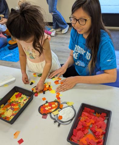parent and child doing a craft