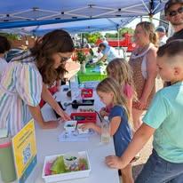 kids doing a craft at a table