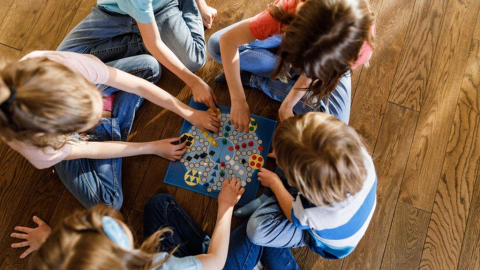 children playing a board game